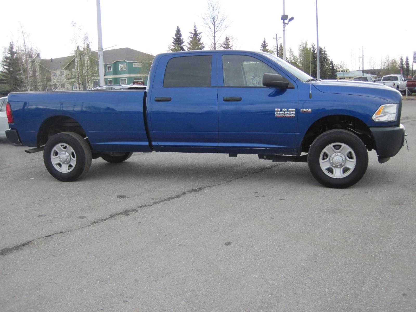 2014 blue /gray RAM 2500 Tradesman Crew Cab 4WD (3C6TR5HT1EG) with an 5.7L V8 OHV 16V engine, automatic transmission, located at 9530 Old Seward Highway, Anchorage, AK, 99515, (907) 349-3343, 61.134140, -149.865570 - Photo #3